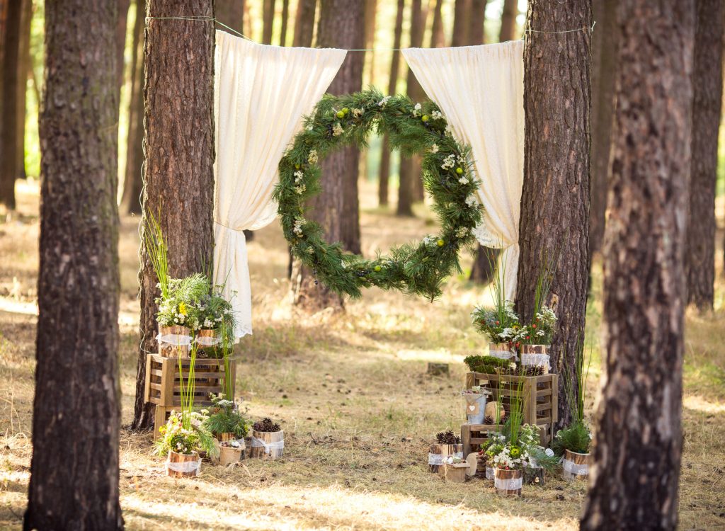 Wedding arch in rustic style in forest
